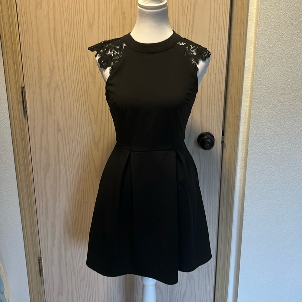 Size small black dress from the brand speechless.